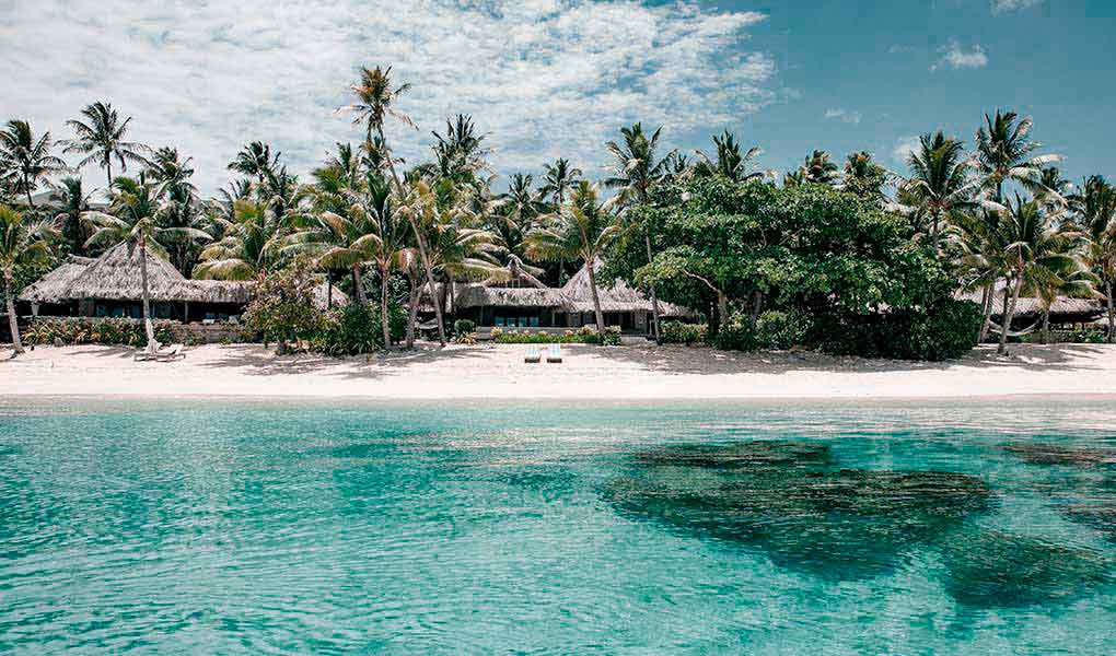 Mar cristalino villas sobre la playa en Fiji Kokomo Private Island